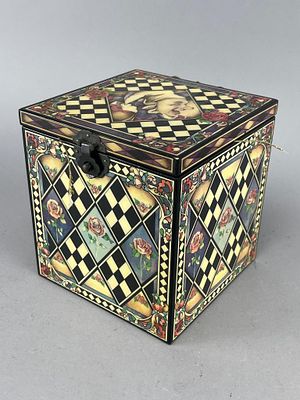 Decorative Harlequin Motif Box with Doll. Decorative box featuring colorful harlequin and rose 