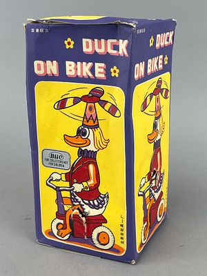 Vintage Wind-Up Duck on Bike Toy w/Box. Vintage tin toy wind-up 'Duck on Bike,' brightly painted 