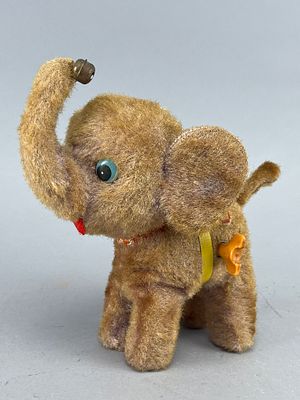 Vintage Plush Wind-Up Elephant Toy, 7". Vintage wind-up plush elephant toy with brown 