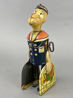 Pop Eye Tin Sailor Wind-Up Toy, 8 Inches. Vintage tin lithographed wind-up toy depicting a 