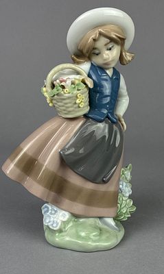 Lladro 5221 ‘Sweet Scent' Porcelain Figurine. Lladro porcelain figurine titled 'Sweet Scent,' 