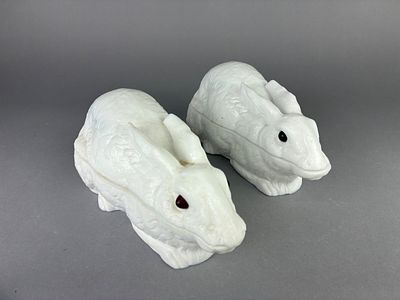 Pair of Ceramic Rabbit Covered Dishes. Pair of white ceramic rabbit-shaped dishes with removable 
