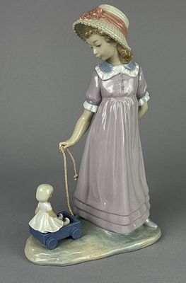 Lladr&oacute; 5044 Girl with Doll in Wagon Figurine. Lladr&oacute; porcelain figurine, model number 5044 