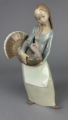 Lladro 4814 ‘Girl with Turkey’ Figurine. Lladro ceramic figurine handcrafted in Spain, depicting 