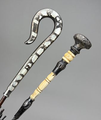 2 Antique Umbrellas Sterling & Mother of Pearl. Two antique umbrellas, one with inlaid mother of 