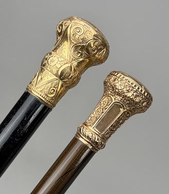 2 Antique Gold Filled Canes Christmas 1895. Two antique canes both with engraved floral and 