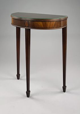 Federal Revival Mahogany Demilune Table. Federal Revival demilune table, with tapered legs 