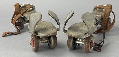 Globe Skate Corp. Vintage Roller Skates with Red Wheels. Pair of vintage roller skates by Globe 