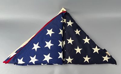 American Flag Design Cotton Textile with Grommet. Two triangular folded American flags 