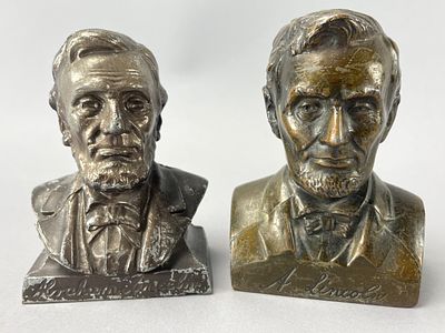 Pair of Abraham Lincoln Metal Busts with Bank Plaque. Pair of Abraham Lincoln bust banks in 