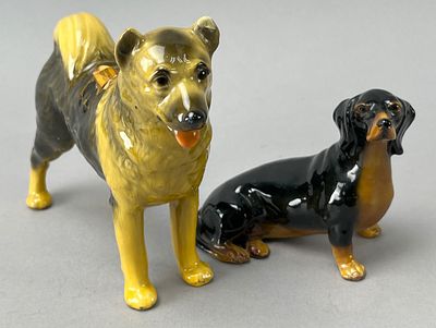 Mortens Ceramic Dog Figurines, Pair, Glossy Finish. Pair of ceramic dog figurines by Mortens 
