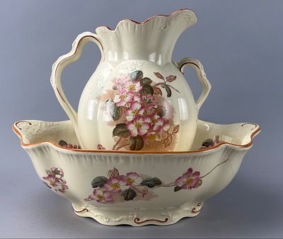 Ceramic Ewer and Basin Set with Floral Decoration. Ceramic pitcher and basin set featuring pink 