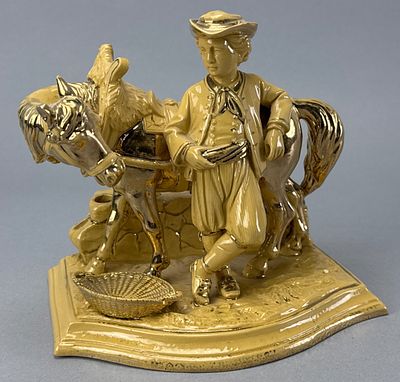 Eichwald Yellow Ware Figurine of Boy with Horse, 5.5 inches wide. Eichwald yellow ware figurine 