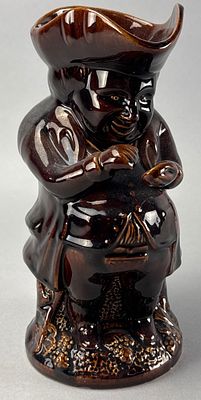 Bennington Ceramic Pitcher, Standing Figure, 9.5 Inches. Bennington ceramic pitcher in the form 