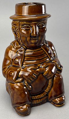 Bennington Pottery Ceramic Figure With Rope Handle T-I, 8 inches tall. Bennington Pottery 