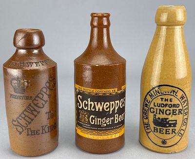 Schweppes Stoneware Ginger Beer Bottles, Largest 8 Inches. Group of three stoneware ginger beer 