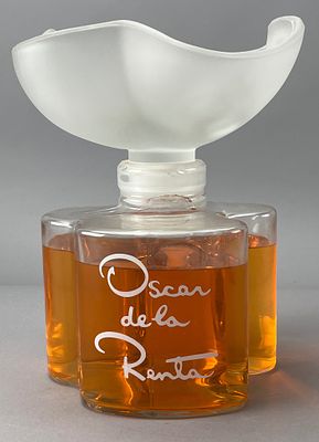 Oscar de la Renta Perfume Bottle with Frosted Glass Cap. Oscar de la Renta clear glass perfume 