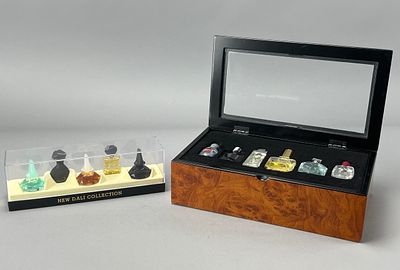 Miniature Perfume Bottle Sets: Burl Wood and Dali Acrylic Cases. Miniature perfume bottle set in 