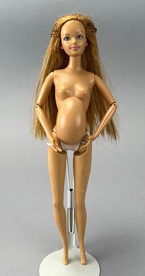 Mattel Barbie Happy Family Midge Doll Pregnant Mom, made of plastic and marked "&copy;2002 Mattel 