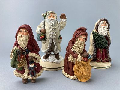 June McKenna Santa Claus Figurine Set, Painted Resin. Set of four June McKenna Santa Claus 
