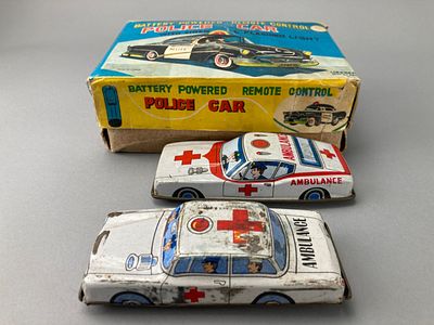 Tin Toy Car Set with Police and Ambulance Cars. Tin toy car set featuring a police car and an 
