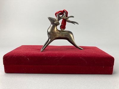 International Silver Co. Metal Reindeer Ornaments Set. Set of metal reindeer ornaments by 