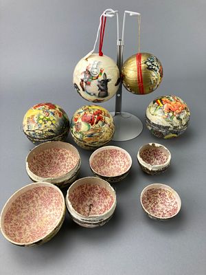 Set of Holiday Paper Mache Ornaments with Graphics. Set of nesting holiday-themed paper mache 