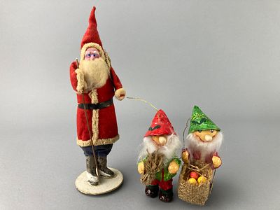Santa Claus and Gnome Figures, Mixed Materials. Group of three collectible figures including one 