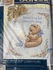 Assortment of Cross Stitch Kits and Quilted Bibs. Assortment of cross stitch kits and quilted Image - 2