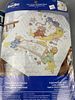 Assortment of Cross Stitch Kits and Quilted Bibs. Assortment of cross stitch kits and quilted Image - 3