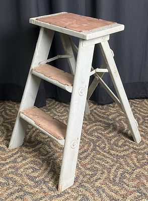 Wooden Step Ladder with Metal Hinges. Wooden step ladder with three steps, painted light gray. 