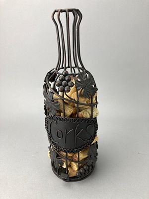 Metal Wire Grape Motif Cork Holder. Metal wire bottle-shaped holder featuring decorative grape 