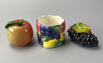 Fitz and Floyd Ceramic Fruit Container and Figurines. Fitz and Floyd ceramic fruit-themed 
