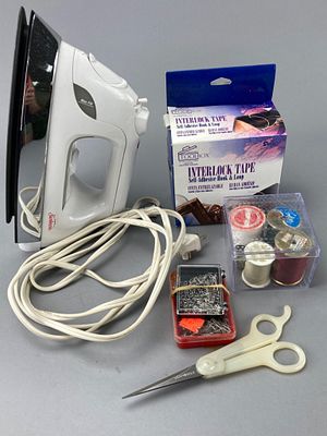 Assortment of Sewing and Ironing Tools. Assortment of sewing and ironing tools made of plastic 