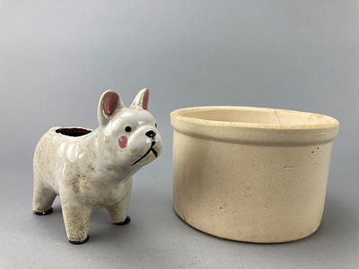 Ceramic Dog Figure with Round Container. Ceramic figure of a dog with a glossy finish and pink 