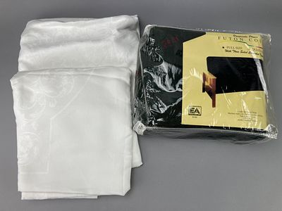 Textile Futon Cover and Table Cloths. Two large table cloths with floral and scroll pattern. One 