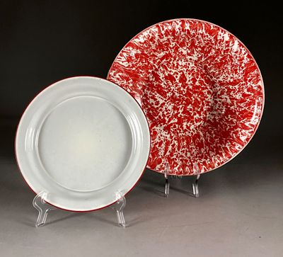 Enameled Red Graniteware Bowl and White Plate. Two enameled kitchenware pieces, a large red and 