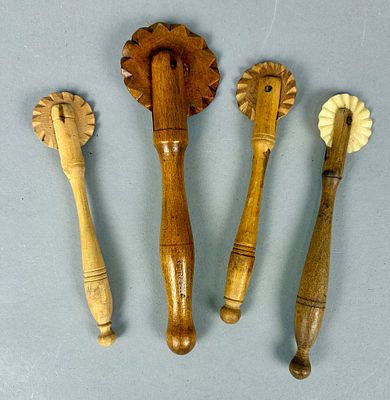 4 Wood Pastry Wheels or Pastry Jiggers. Four treenware pastry wheels, or pastry jiggers 