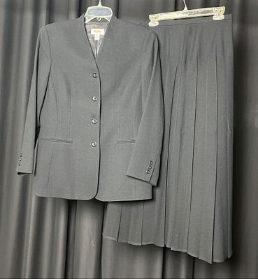 Talbots Black Wool Suit with Pleated Skirt. Talbots women's black wool suit featuring a jacket 
