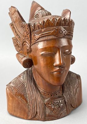 Carved Wooden Bust with Headdress and Earrings. Carved wooden bust featuring intricate detailing 