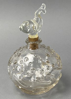 Glass Perfume Bottle with Fish-Shaped Stopper. Clear glass perfume bottle featuring a 