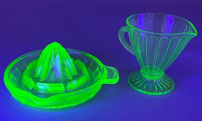 Green Glass Juicer and Creamer Set, Uranium Glass. Green glass juicer with a reamer and spout 