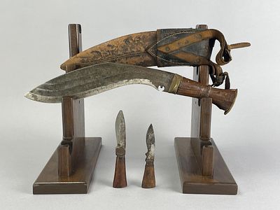 Nepalese Kukri Knife Set. Traditional Nepalese kukri with an 11-inch recurved steel blade 
