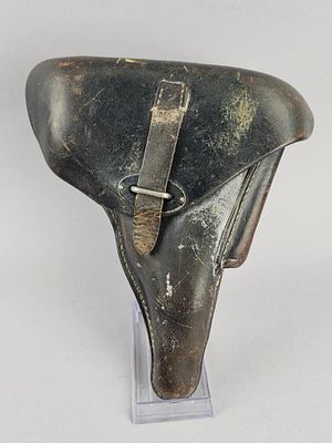 Possible WWII German P38 Holster. German black leather hardshell pistol holster configured for 