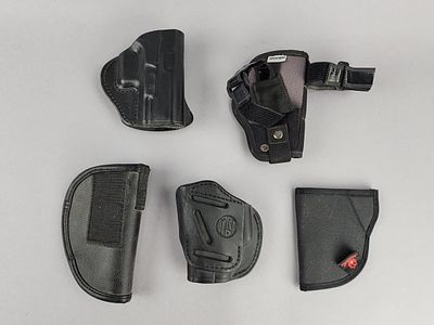 5 Concealed Carry Holsters. Five assorted concealed-carry handgun holsters comprising a SIG 