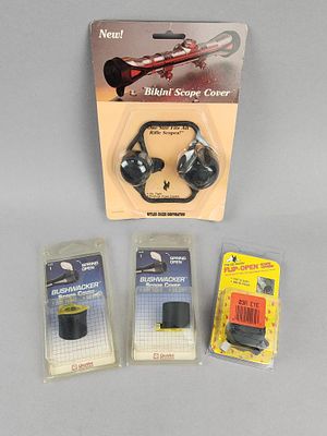 Rifle Scope Lens Covers. Five rifle scope lens covers in four retail packages, comprising a 