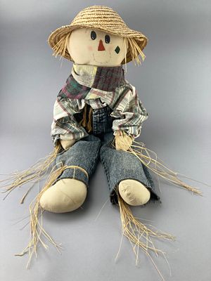 The Sassy Cow, Inc. Scarecrow Doll with Straw Hat. Stuffed scarecrow doll handcrafted by The 