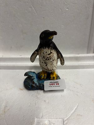 Cast iron penguin 4.5x3.5 inches