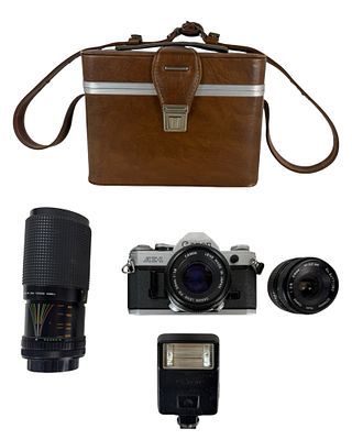 Canon AE-1 35mm SLR Camera Outfit with Lenses. Vintage Canon AE-1 35mm SLR film camera with 