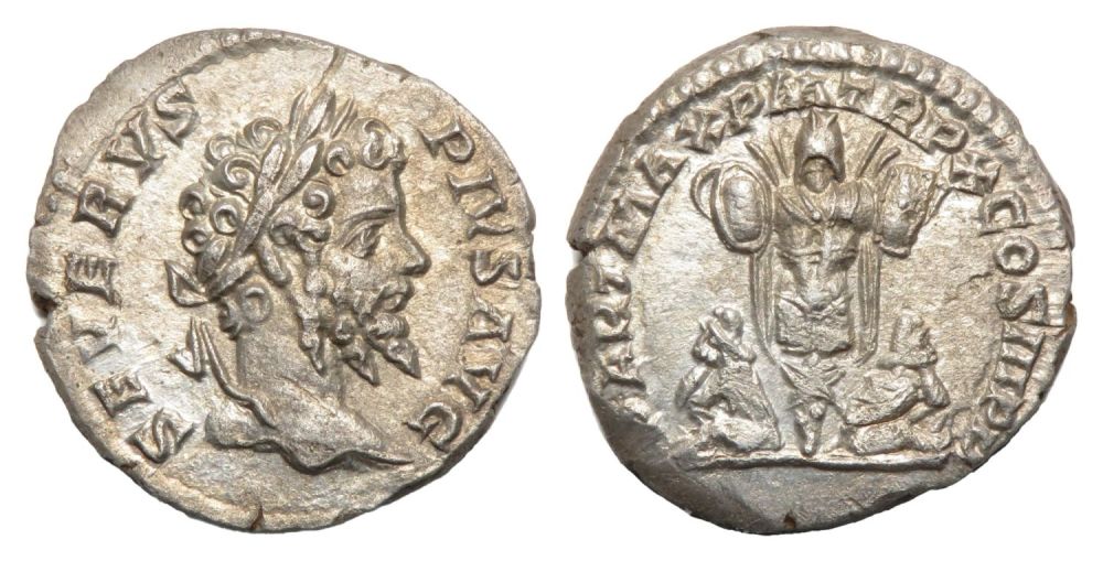 Lot 128: Septimius Severus Denarius. Rome, AD 202. Silver, 2.17g....